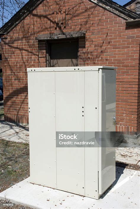 communication box electrical|telecommunications box in yard.